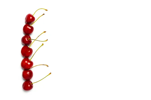 Sweet wild red cherries on white background — Stock Photo, Image