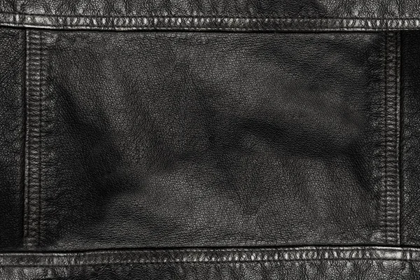 Black leather texture background with seams on all sides — Stock Photo, Image