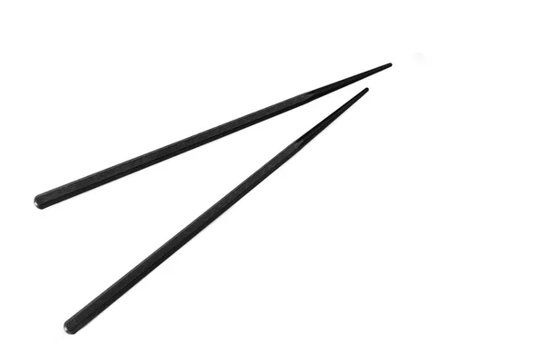 Pair of black chopsticks on white — Stock Photo, Image