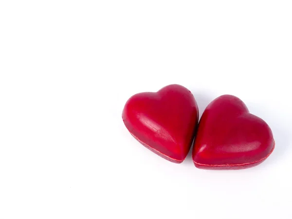 Dos caramelos de chocolate en forma de corazón — Foto de Stock