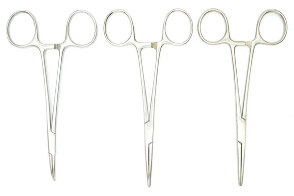 Three Surgical Clamps Isolated White Background Top View Directly — Stock Photo, Image