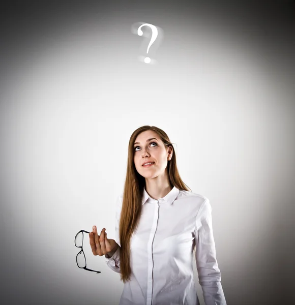 Woman in white and question mark — Stock Photo, Image