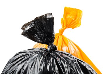 Turuncu ve siyah çöp torbaları