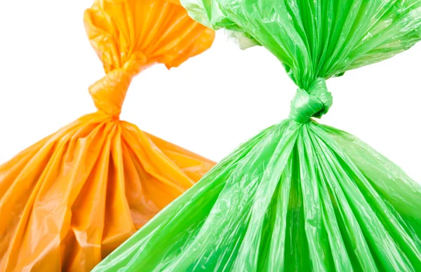 Sacchetti di immondizia verde e arancione — Foto Stock