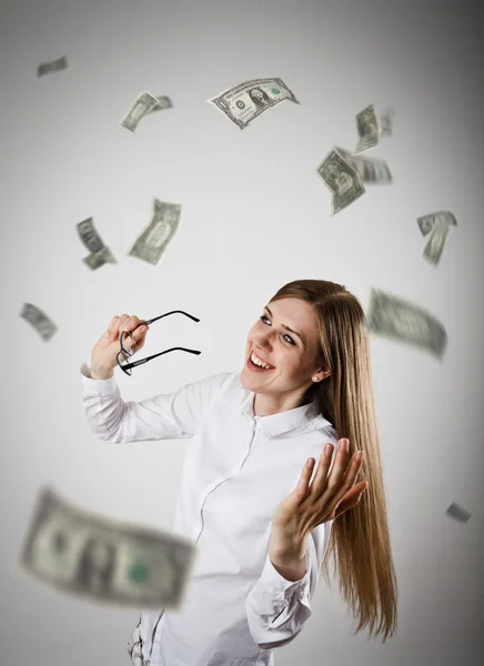 Jubel. Frau in Weiß und Dollars. — Stockfoto