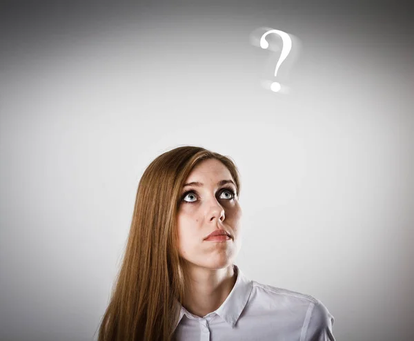 Woman in white and question mark — Stock Photo, Image