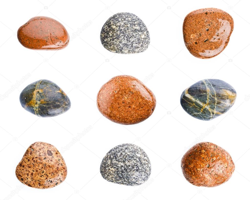 Wet sea stones isolated on white background. Set of sea stones.