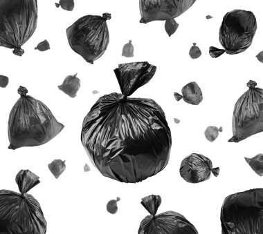 Beyaz üzerine siyah çöp torbaları.