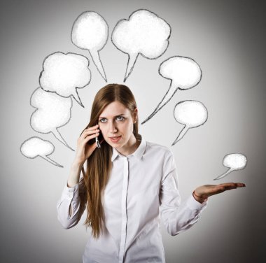Woman in white with telephone and blank speech bubbles over her  clipart