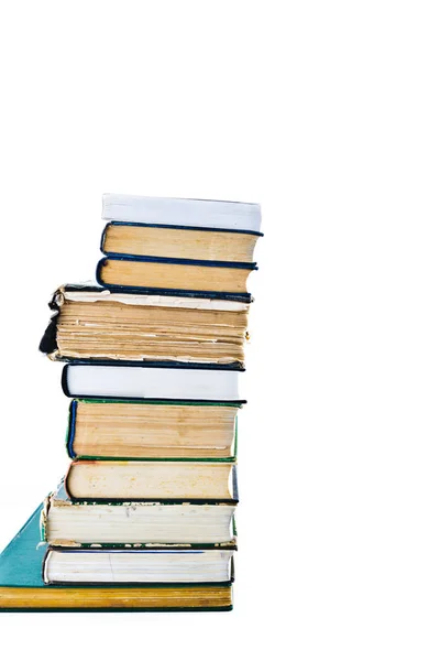 Mucchio di vecchi libri isolati su bianco — Foto Stock