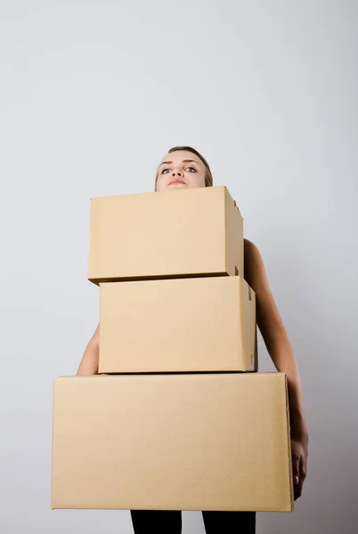Woman and cardboards. — Stock Photo, Image