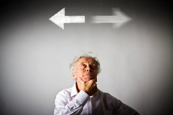 Old man in white and two arrows. — Stock Photo, Image