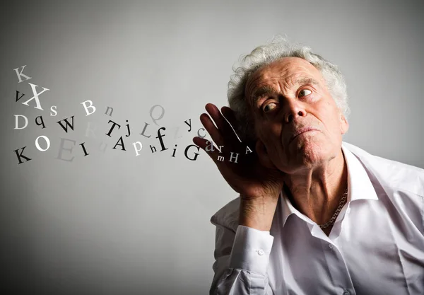 Viejo curioso en blanco y letras . — Foto de Stock