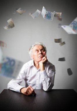 Yaşlı adam beyaz ve Euro.