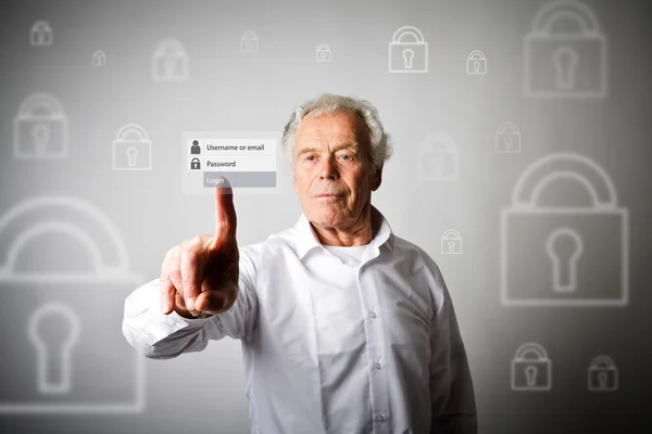 Alter Mann drückt den virtuellen Knopf. Login und Passwort concep — Stockfoto