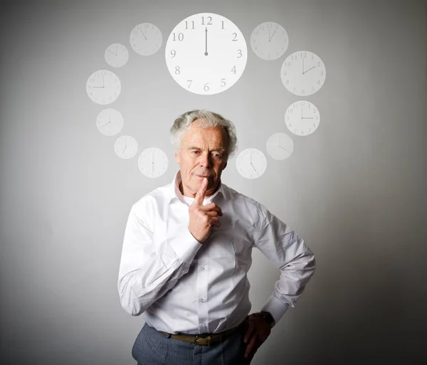 Old man in white and all day. Time is passing. — Stock Photo, Image