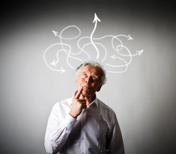 Hesitation. Old man in thoughts and arrows. — Stock Photo, Image