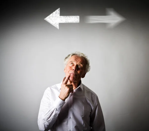 Old man in white and two arrows. — Stock Photo, Image