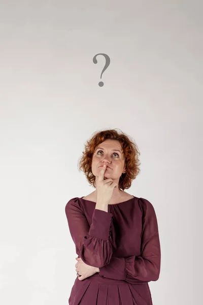 Red-haired woman and Question Mark. — Stock Photo, Image