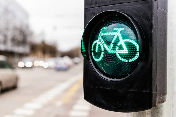 Traffic light for cyclists. Green light for bycicle lane on a tr