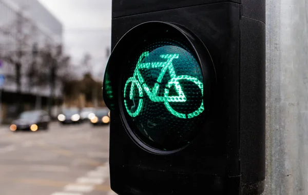 Traffic light for cyclists. Green light for bycicle lane on a tr