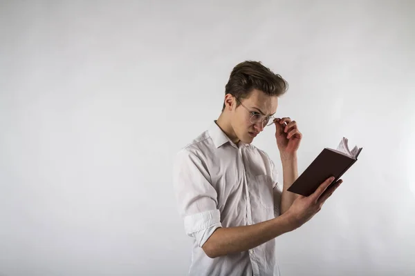 Young Man Holding Workbook His Hands Guy Glasses — Stock Photo, Image