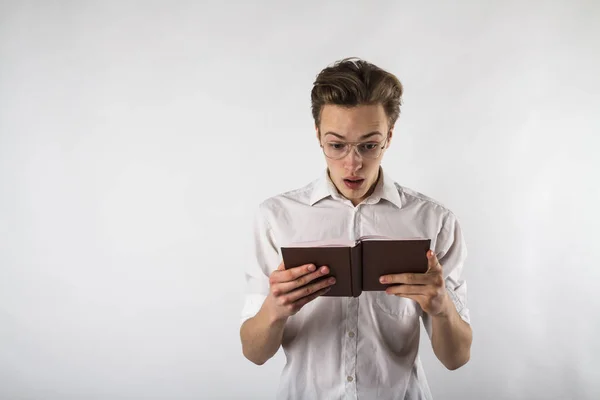 Young Man Holding Workbook His Hands Guy Glasses — Stock Photo, Image