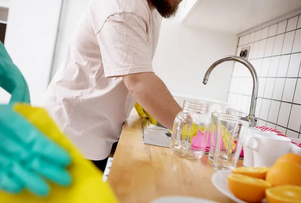 Washing the dishes together. — Stock Photo, Image