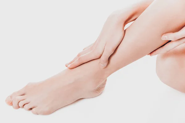 Womens feet on white background. — Stock Photo, Image