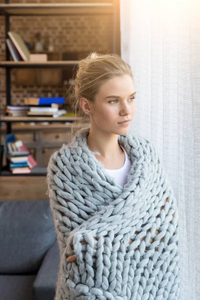 woman in wool blanket