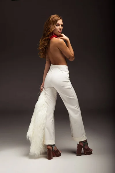 Sexy Woman Naked Back White Trousers Looking Shoulder — Stock Photo, Image