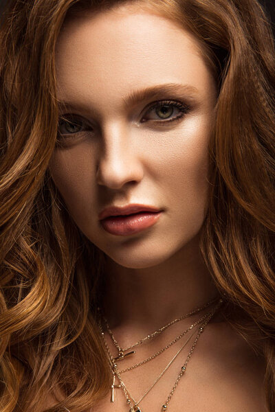 portrait of attractive brown-haired girl looking at camera