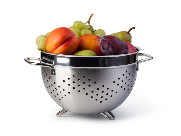 Fresh fruits in colander — Stock Photo, Image
