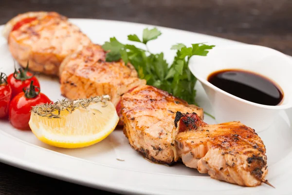 Salmon kebab on a plate — Stock Photo, Image