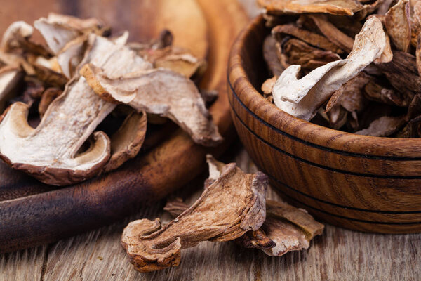 dried mushrooms, on a wooden table