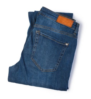 Mavi jeans beyaz arka plan üzerinde katlanmış