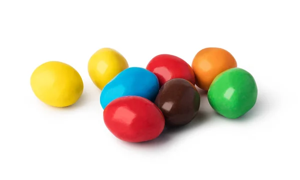 Botones de chocolate de colores sobre un fondo blanco — Foto de Stock