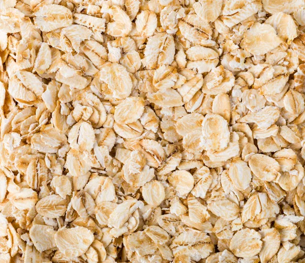 Oatmeal flakes isolated on white background — Stock Photo, Image