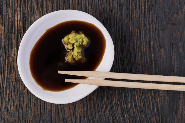 Bowl with soy sauce and wasabi — Stock Photo, Image