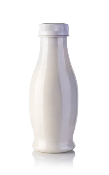 Botella de leche sobre fondo blanco — Foto de Stock