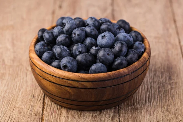 Blueberry on a wooden table — Stock Photo, Image