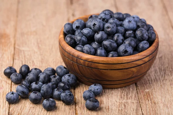 Blueberry on a wooden table — Stock Photo, Image