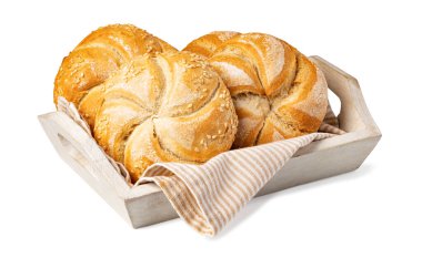 Tasty fresh buns with sesame seeds, isolated on white background