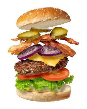 Uçan burger beyaz arka planda izole edilmiş.