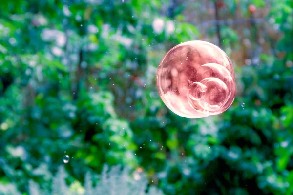 One brown soap bubble.