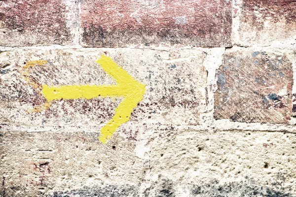 An arrow on a wall — Stock Photo, Image