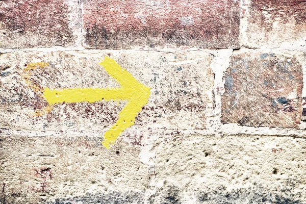 An arrow on a wall