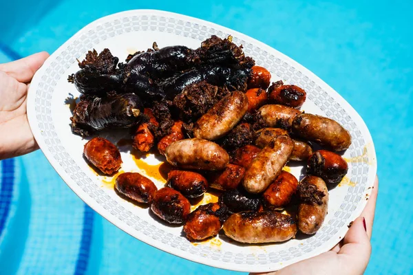 Sausages on plate — Stock Photo, Image