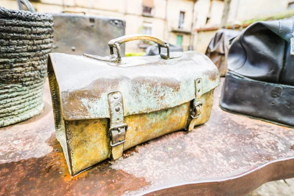 Conceptual stage with bronze footwear — Stock Photo, Image