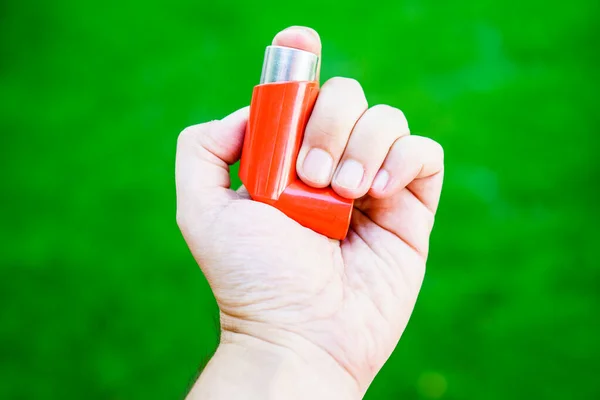 Unrecognizable Person Holding Medical Respirator Asthmatics Green Background — Stock Photo, Image